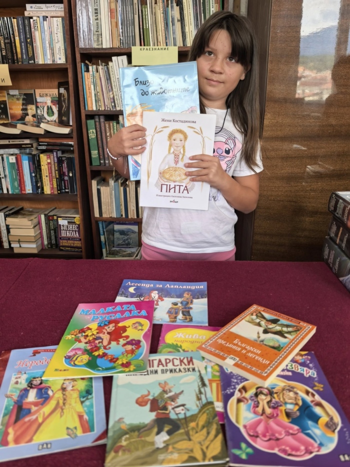 Малка читателка дари книги на читалището в Бачево